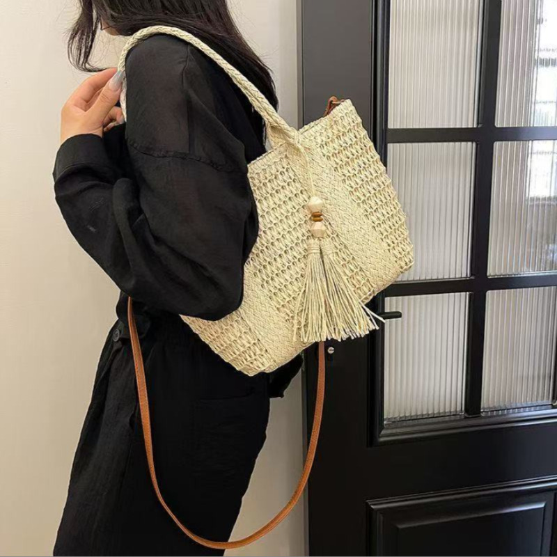 Woven Straw Bag - กระเป๋าถือสตรีสไตล์ใหม่ ทำจากฟางสาน ความจุขนาดใหญ่ พร้อมพู่ห้อย กระเป๋าสะพายไหล่/สะพายข้างสำหรับชายหาด เหมาะสำหรับวันหยุดฤดูร้อน