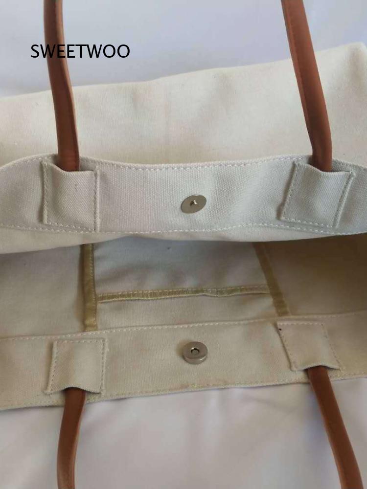 กระเป๋าผ้าแคนวาสพร้อมหูหิ้วหนั - Women'S Work Bags Designer บทวิจารณ์และราคา